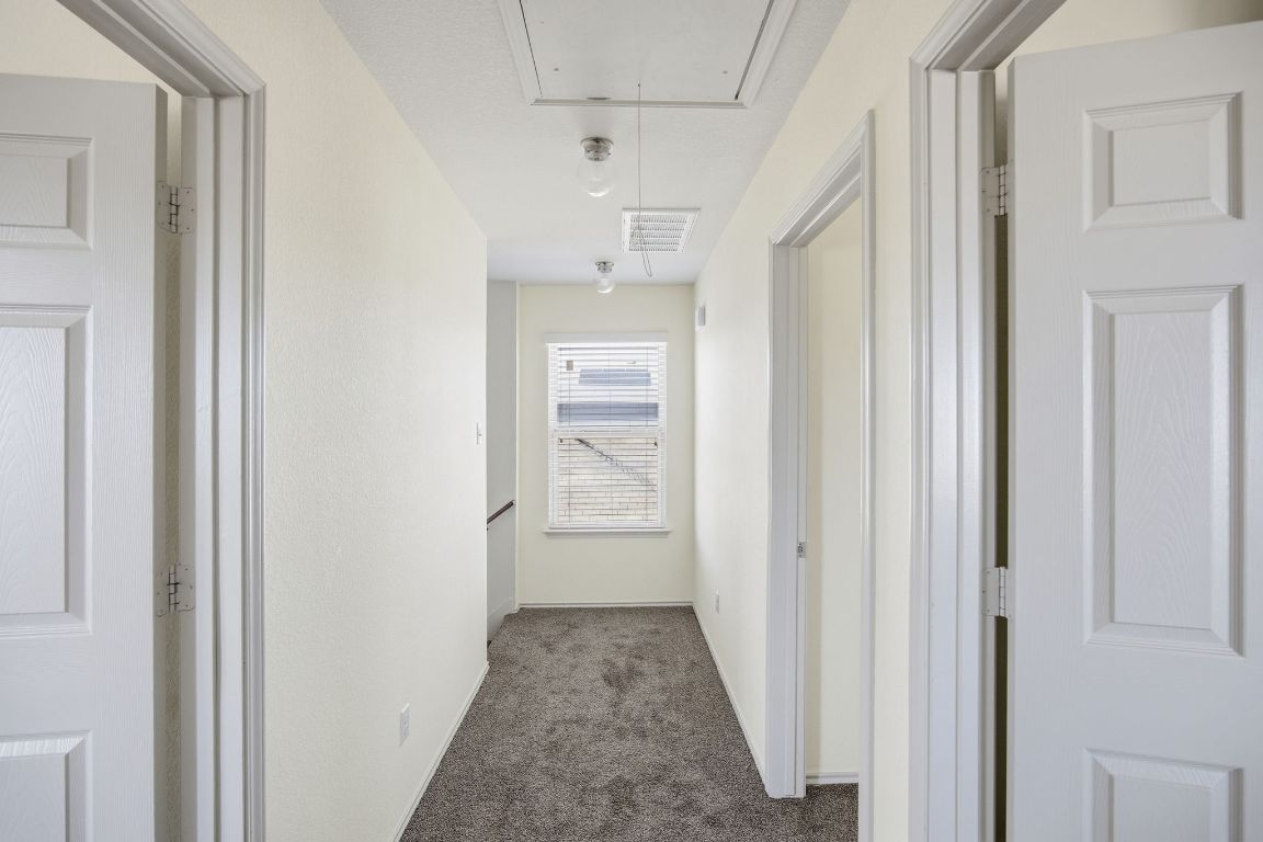 408 Azurite Drive Jarrell, TX 76537 - Photo 16 of 34 a view of hallway with closet