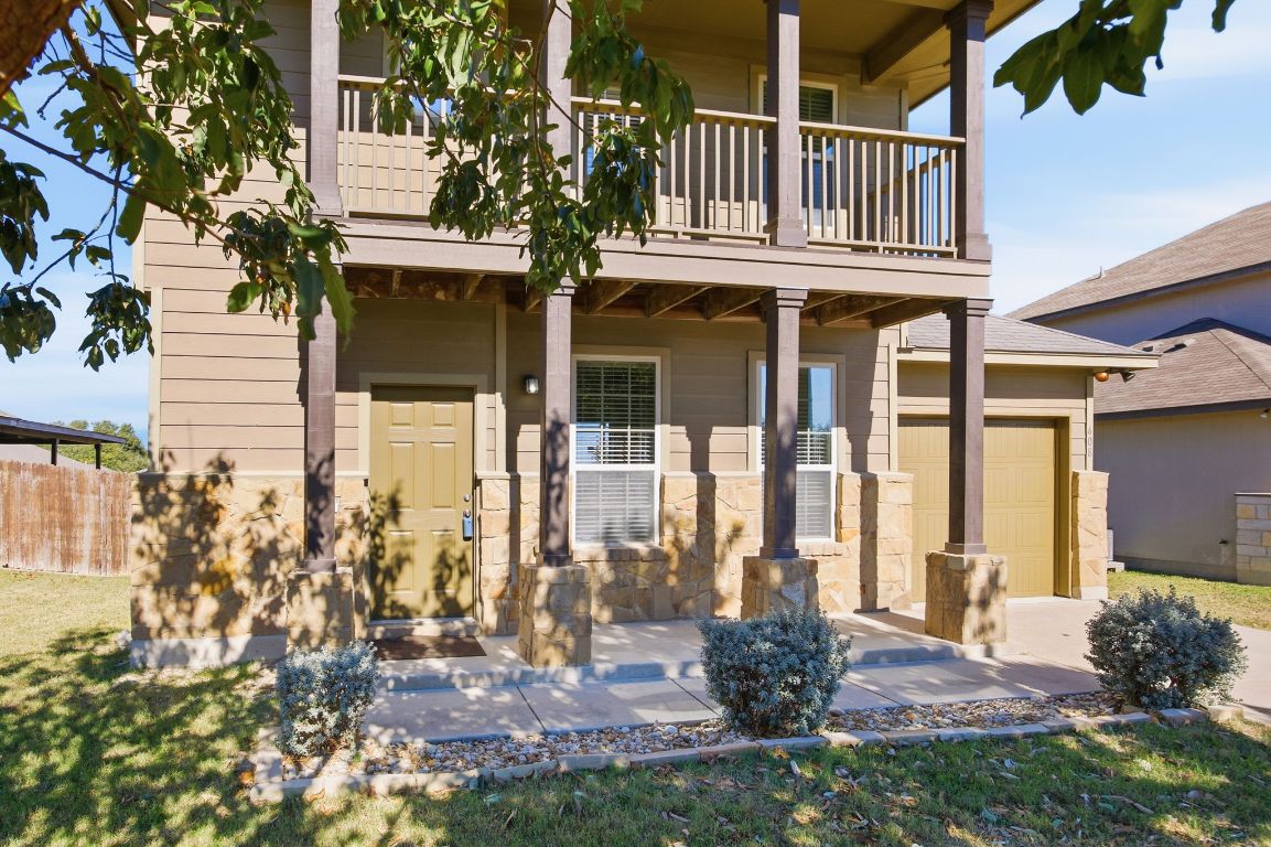 408 Azurite Drive Jarrell, TX 76537 - Photo 2 of 34 a front view of a house with a yard