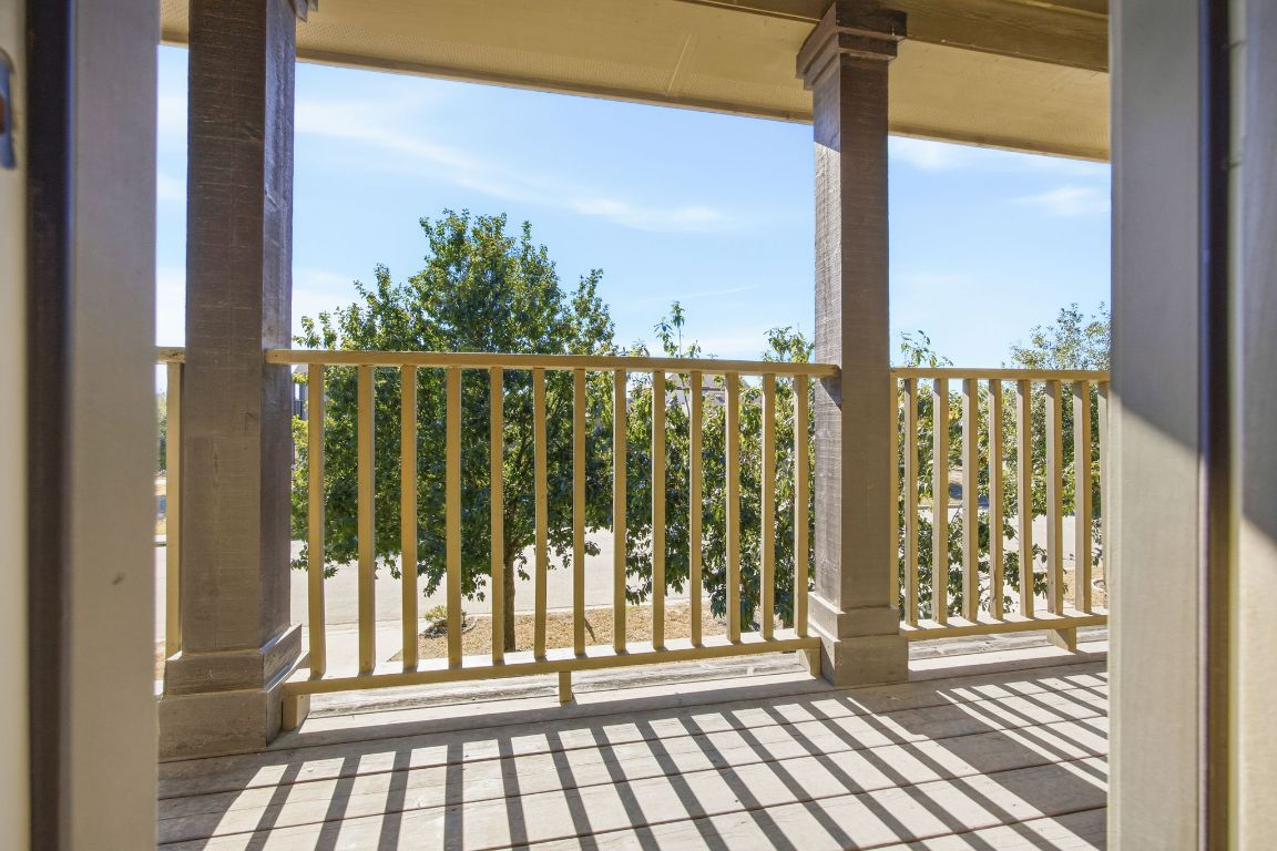 408 Azurite Drive Jarrell, TX 76537 - Photo 27 of 34 a view of a balcony with wooden floor