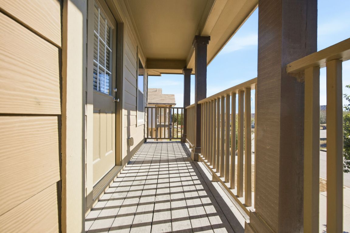 408 Azurite Drive Jarrell, TX 76537 - Photo 28 of 34 a view of a balcony with wooden floor