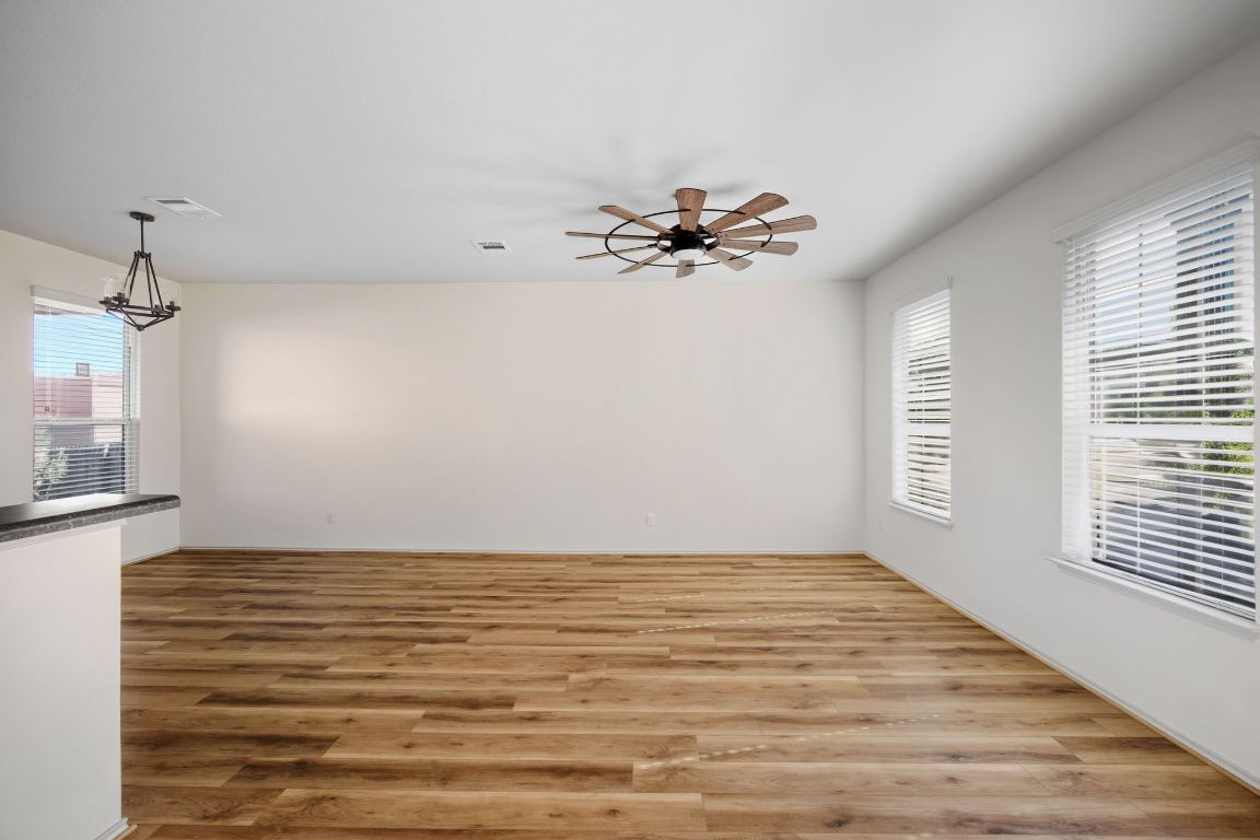 408 Azurite Drive Jarrell, TX 76537 - Photo 4 of 34 a view of a room with a window and a ceiling fan