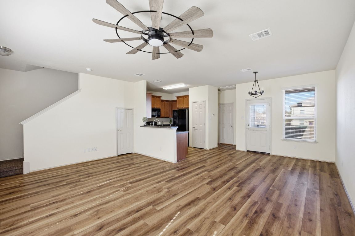 408 Azurite Drive Jarrell, TX 76537 - Photo 6 of 34 a view of empty room with wooden floor