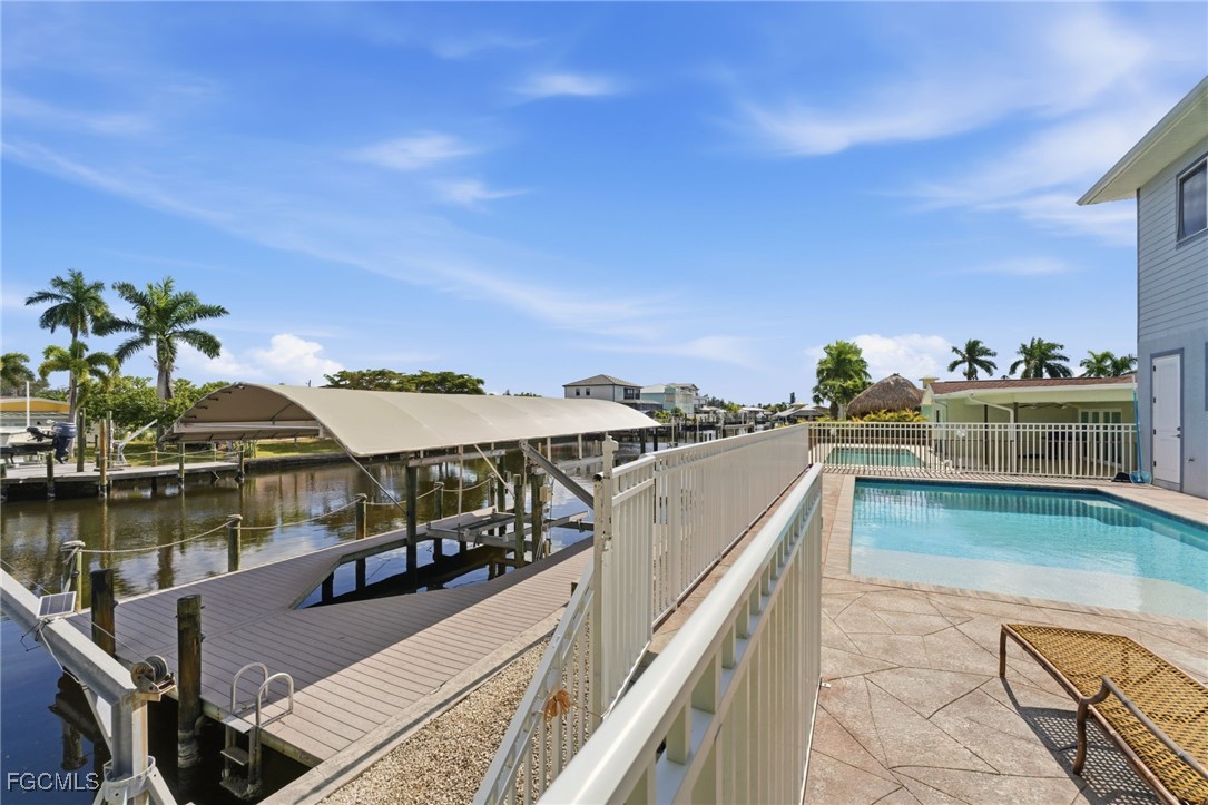 12304 Boat Shell Drive Matlacha Isles, FL 33991 - Photo 5 of 49 a view of a lake with a terrace