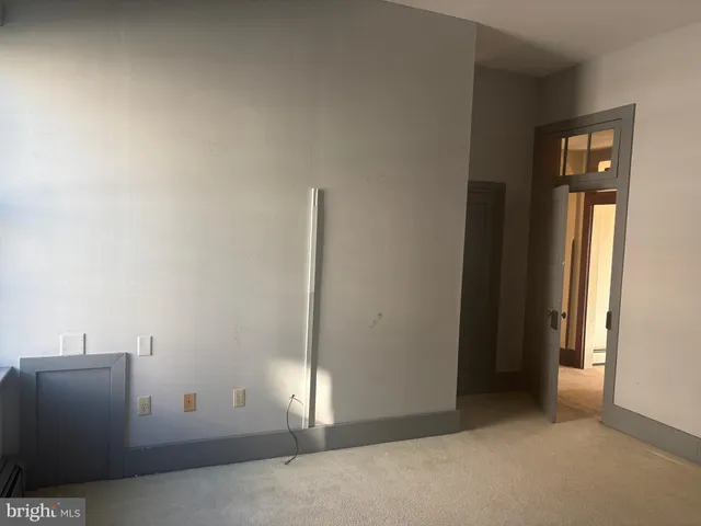 an empty room with window