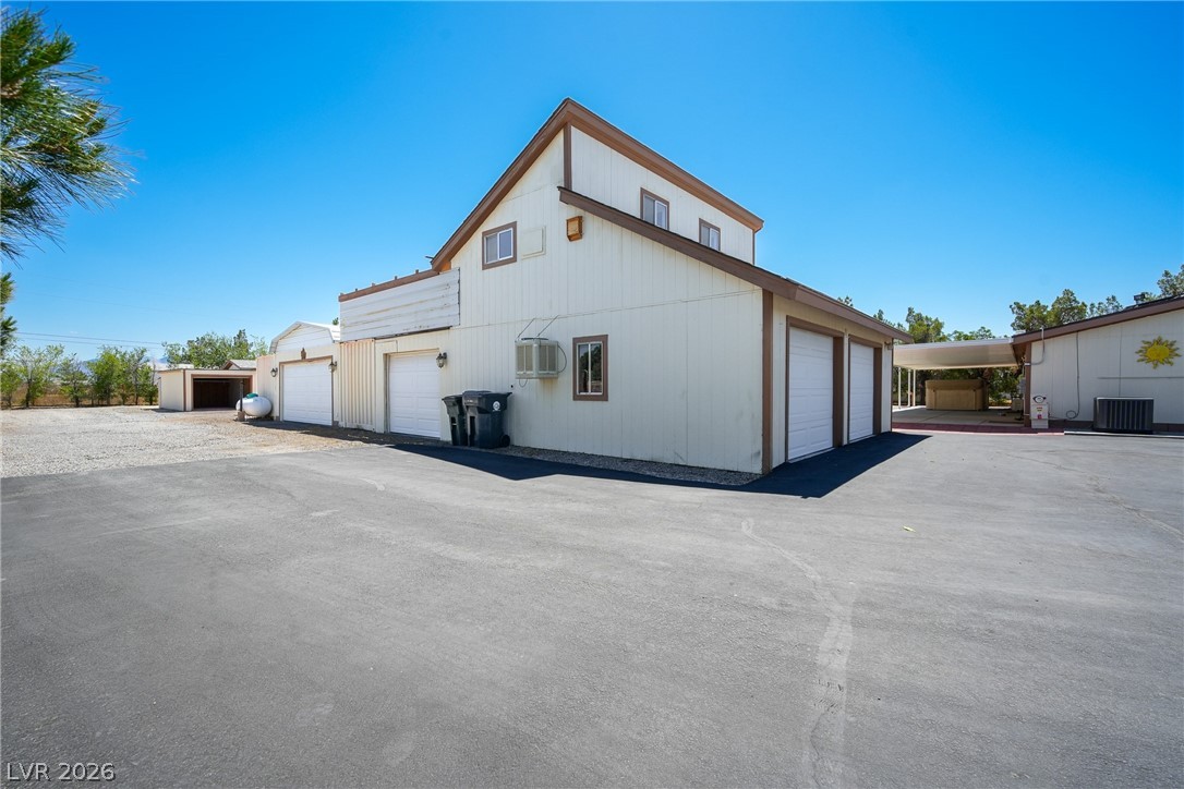 1831 West Horn Road Pahrump, NV 89048 - Photo 19 of 59 Functional garage facilities provide abundant space for vehicles and storage.