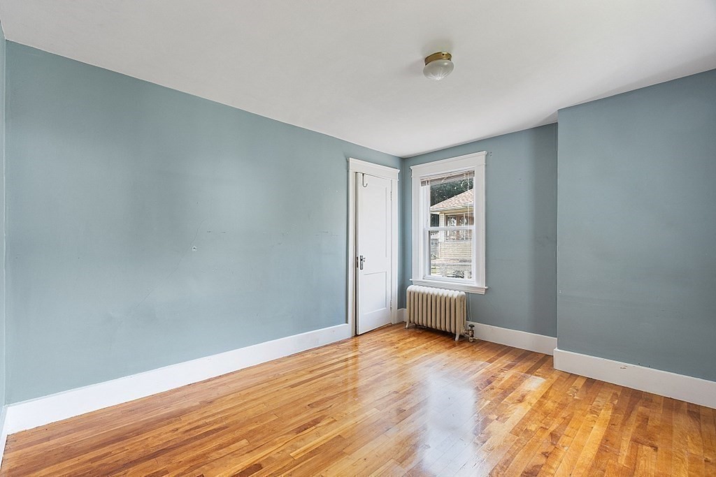 27 Woodman Road Worcester, MA 01602 - Photo 14 of 27 a view of empty room with wooden floor