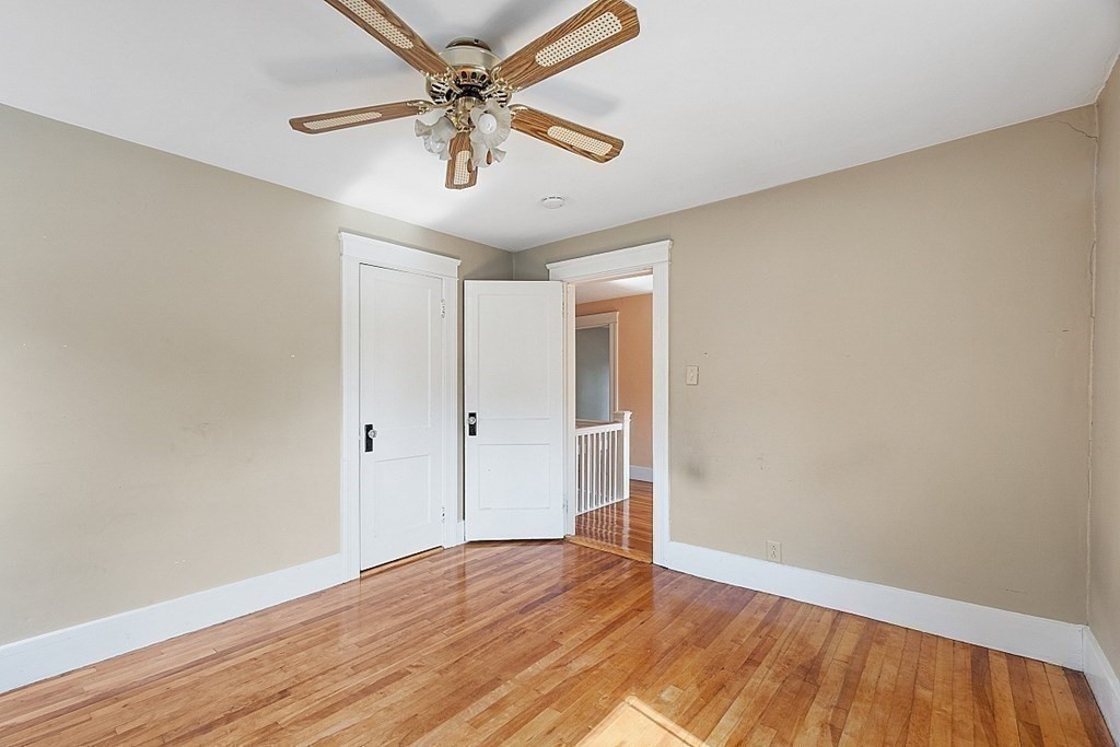 27 Woodman Road Worcester, MA 01602 - Photo 18 of 27 a view of an empty room with wooden floor