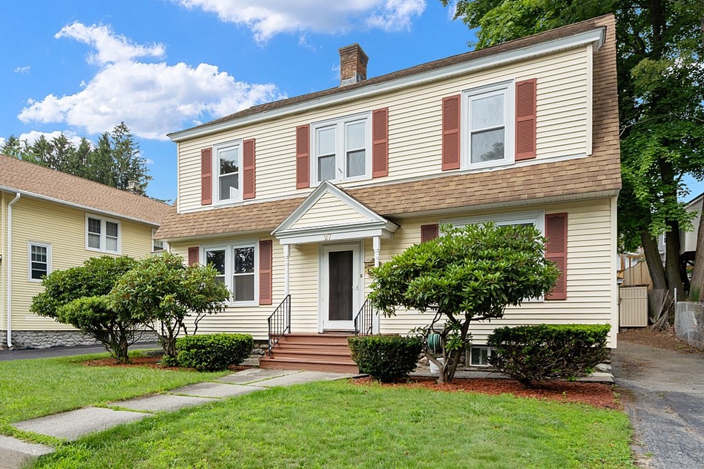 27 Woodman Road Worcester, MA 01602 - Photo 2 of 27 a front view of a house with a yard and potted plants