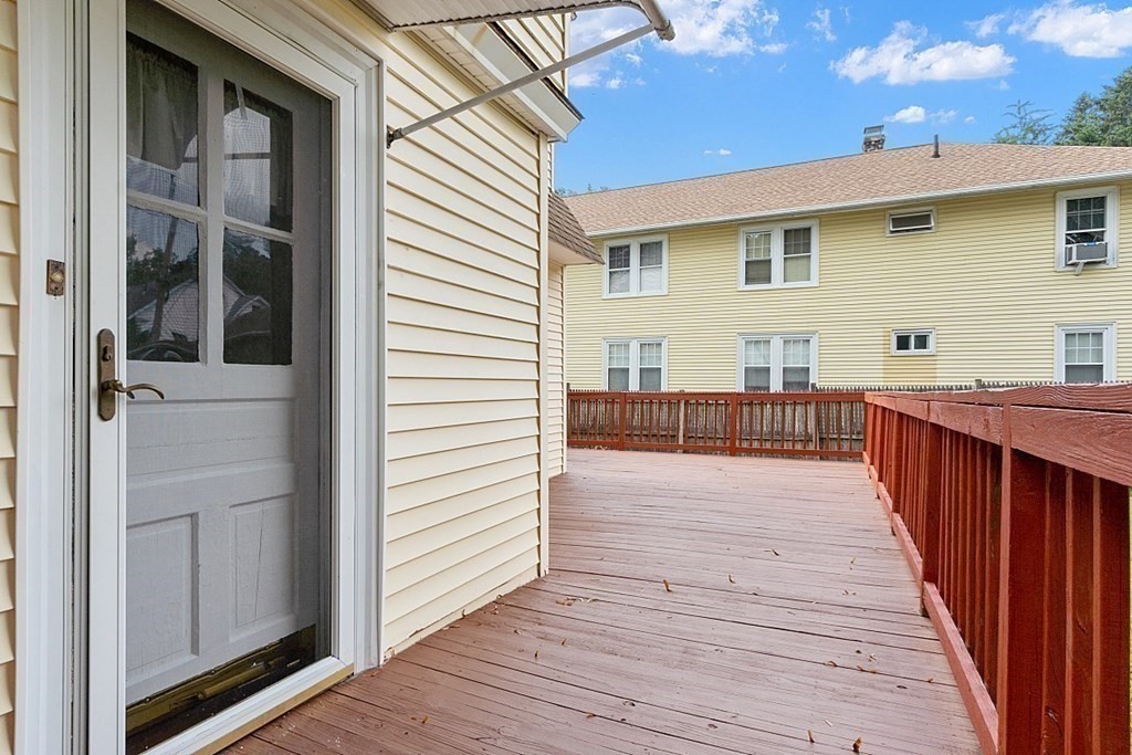 27 Woodman Road Worcester, MA 01602 - Photo 23 of 27 a view of a house with wooden deck