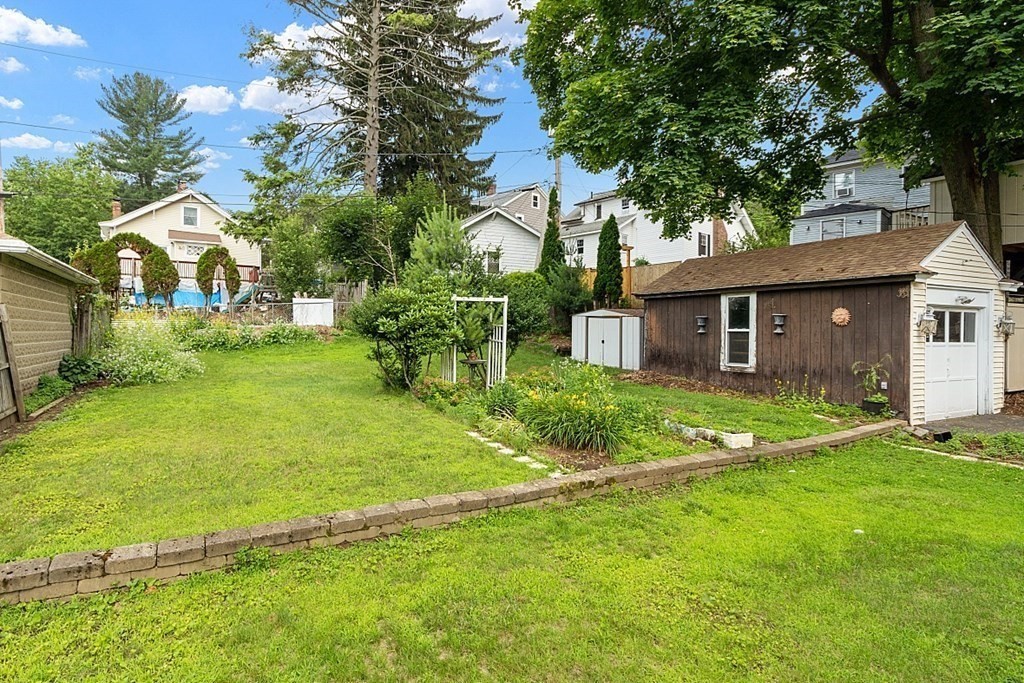 27 Woodman Road Worcester, MA 01602 - Photo 26 of 27 front view of a house with a yard