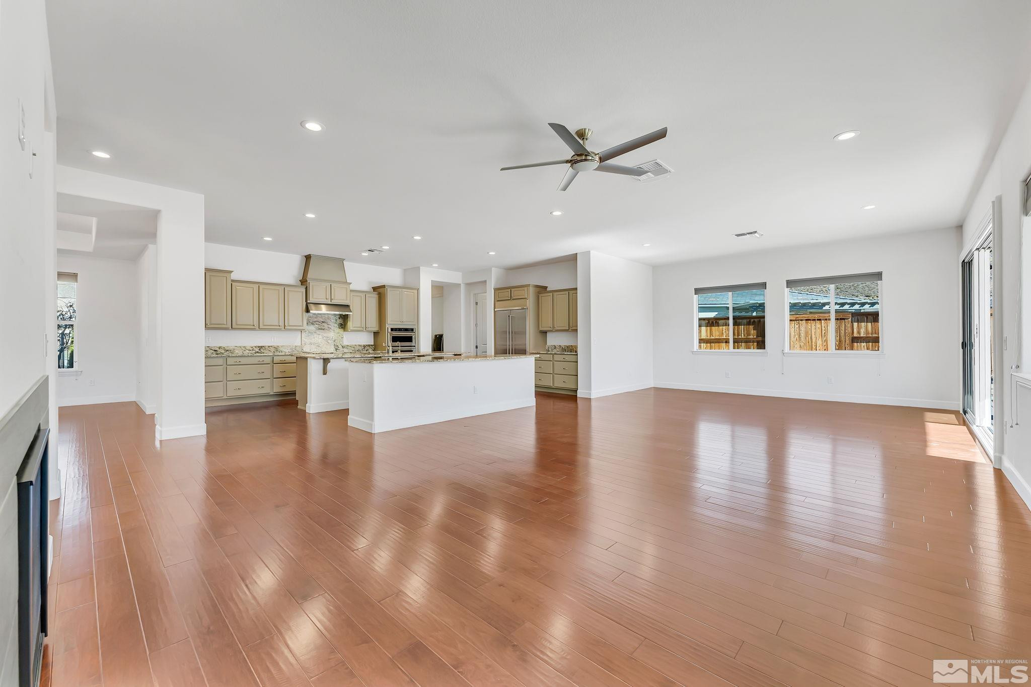 2902 Miramis Court Reno, NV 89521 - Photo 6 of 39 a view of kitchen with furniture and wooden floor