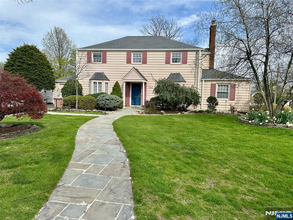 440 Bogert Road River Edge, NJ 07661 - Photo 1 of 25 a front view of a house with a yard