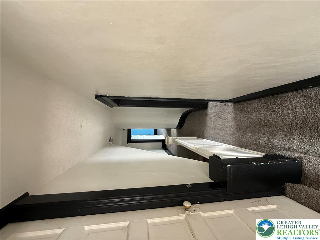 41 West Ridge Street Lansford, PA 18232 - Photo 18 of 40 A clever pet ramp integrated into the staircase offers effortless mobility for furry friends.
