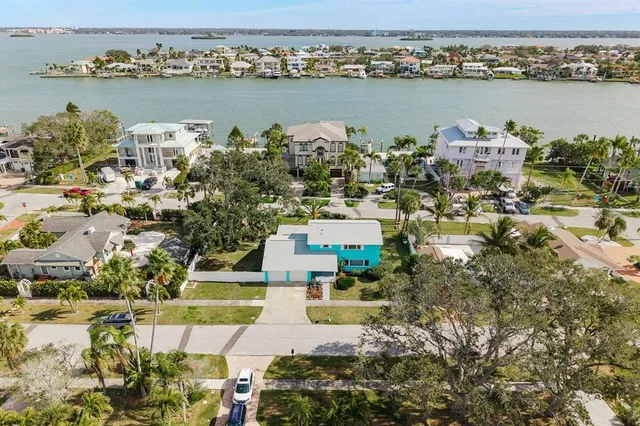 an aerial view of a building with garden view