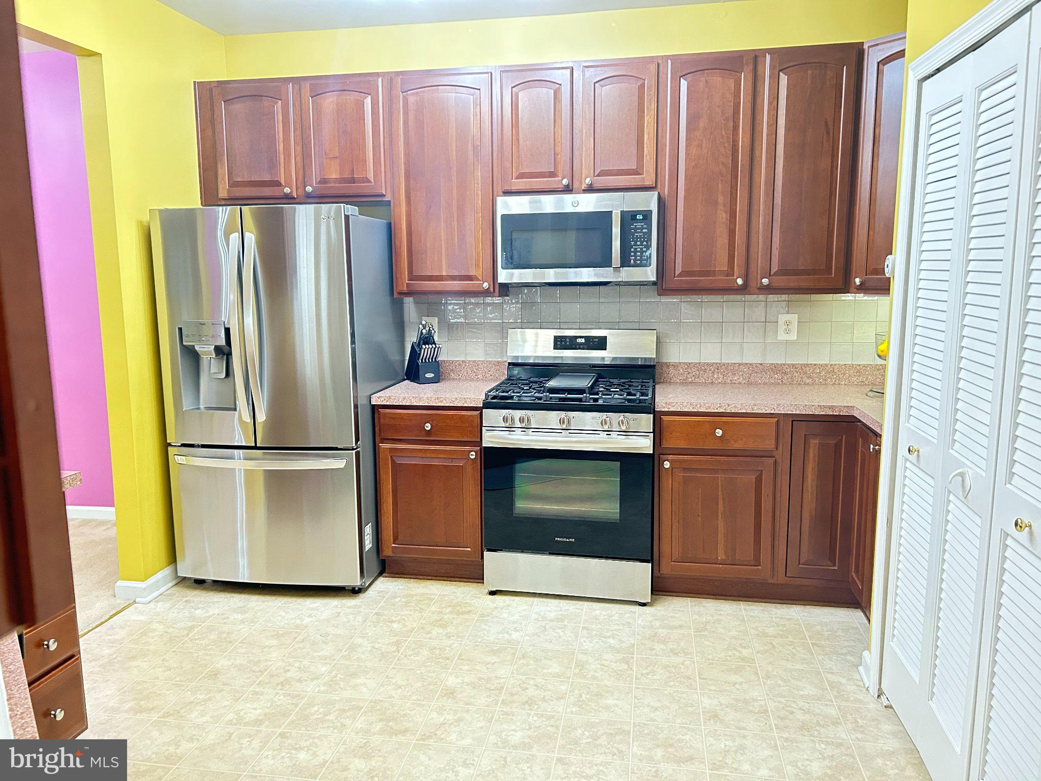 2001 Connor Court, Unit 704D Bowie, MD 20721 - Photo 18 of 33 Bright kitchen with modern appliances.