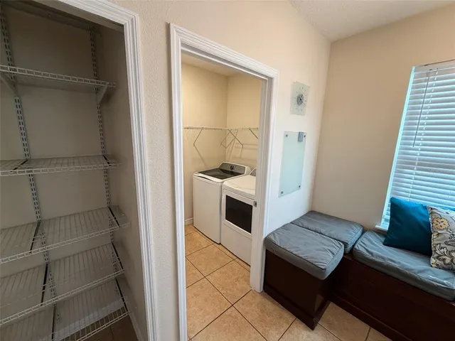 a kitchen with granite countertop a sink and a stove top oven