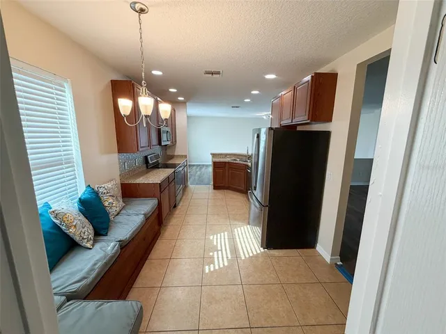 a kitchen with a sink and a dishwasher