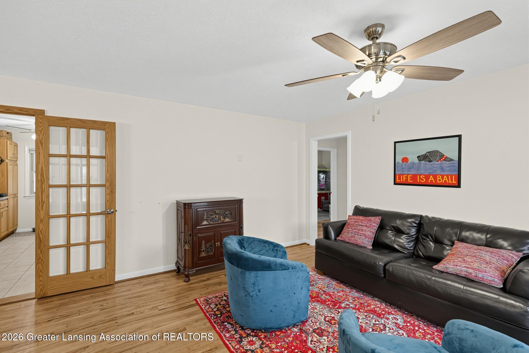 2224 Pembroke Road Lansing, MI 48906 - Photo 11 of 30 Living Room (ceiling fan)