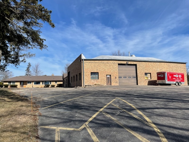 a view of a car park in front of building