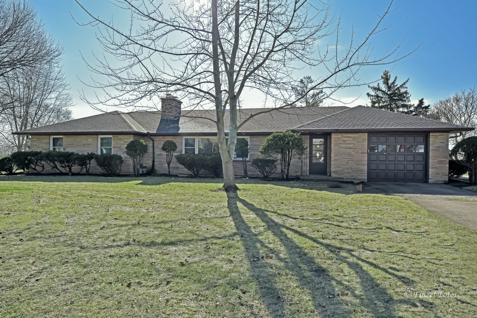 13N055 Coombs Road Elgin, IL 60124 - Photo 2 of 34 a front view of a house with a yard