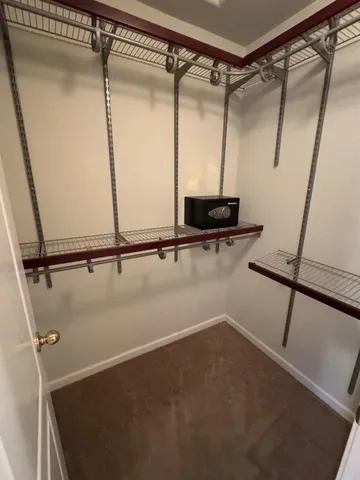 a view of a room with racks on the wall