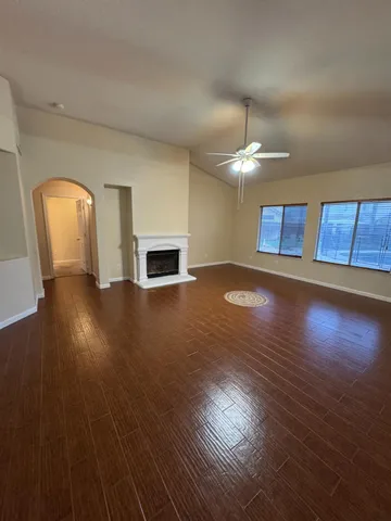 a view of a livingroom with wooden floor