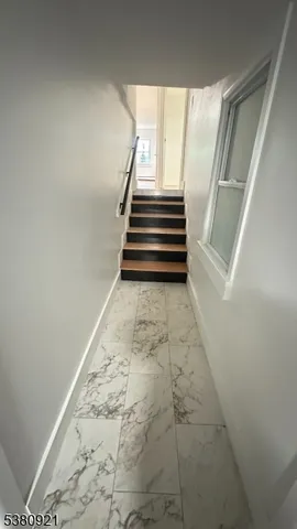 a view of entryway with stairs