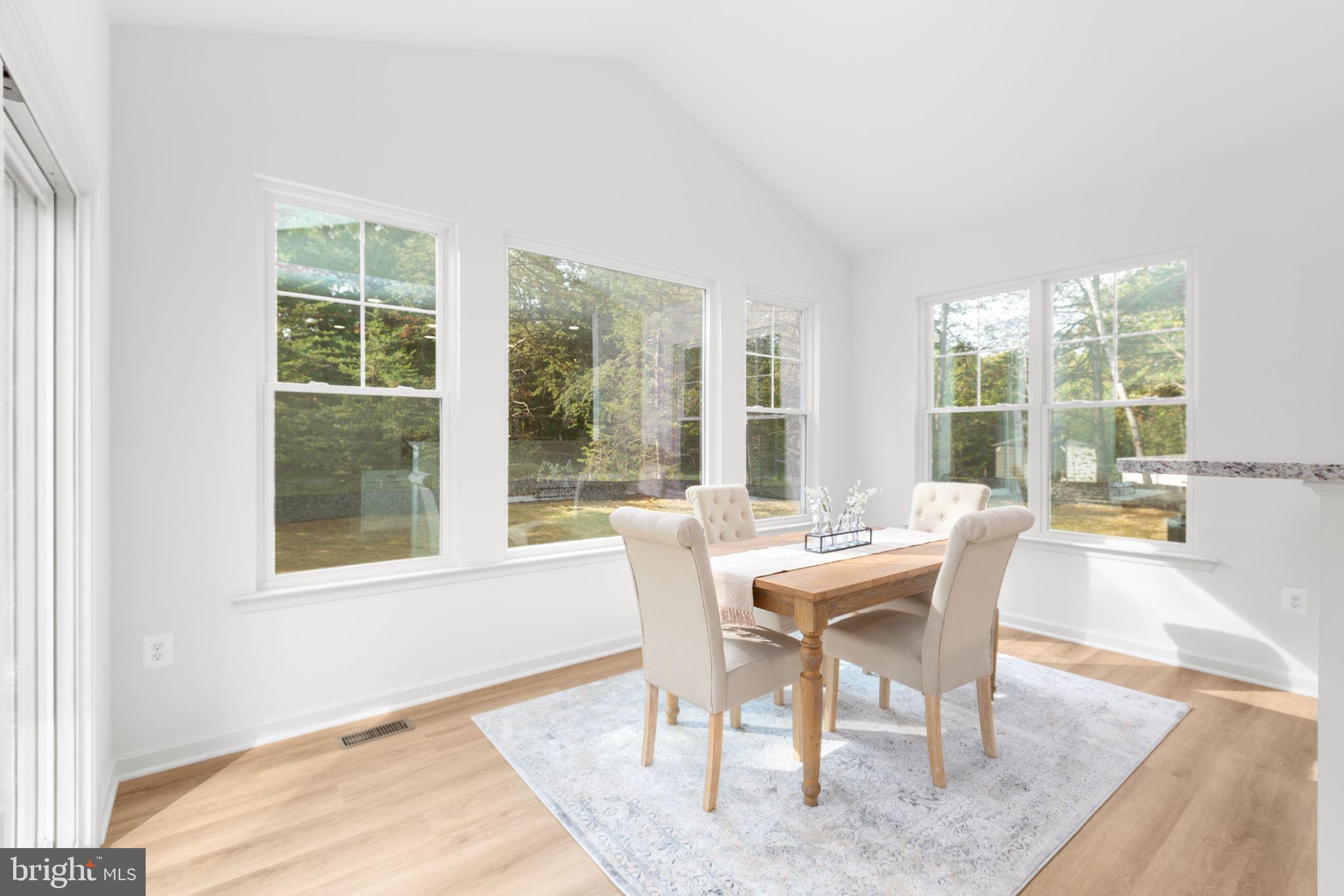 34198 Enchanted Way Locust Grove, VA 22508 - Photo 11 of 62 a dining room with furniture and window