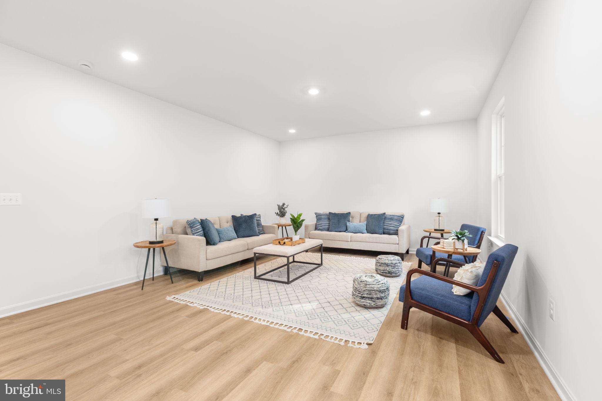 34198 Enchanted Way Locust Grove, VA 22508 - Photo 14 of 62 a living room with furniture and wooden floor