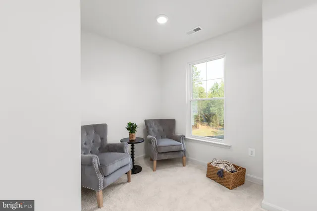 a bathroom with a double vanity sink toilet and a mirror