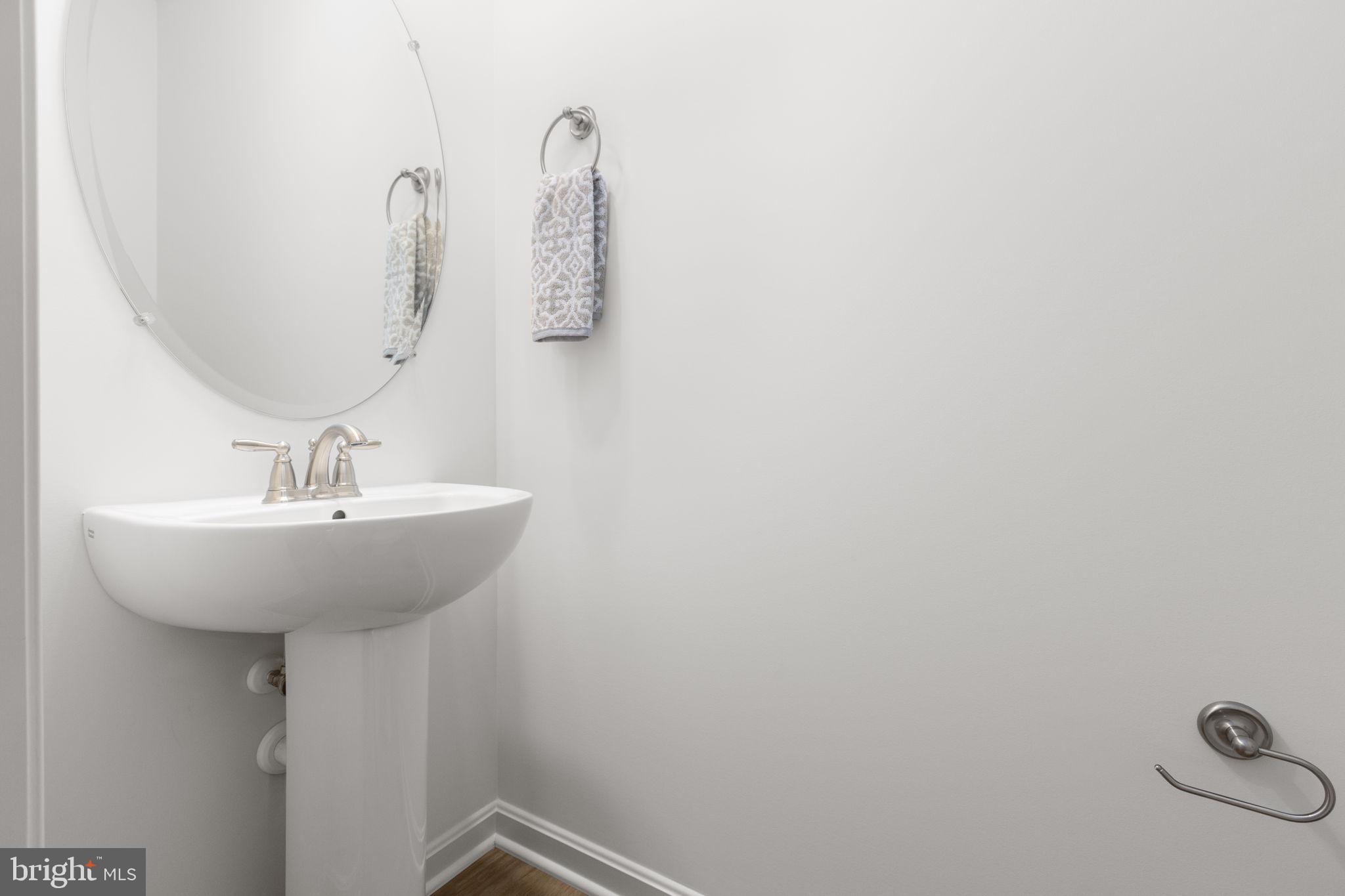 34198 Enchanted Way Locust Grove, VA 22508 - Photo 30 of 62 a bathroom with a sink and mirror