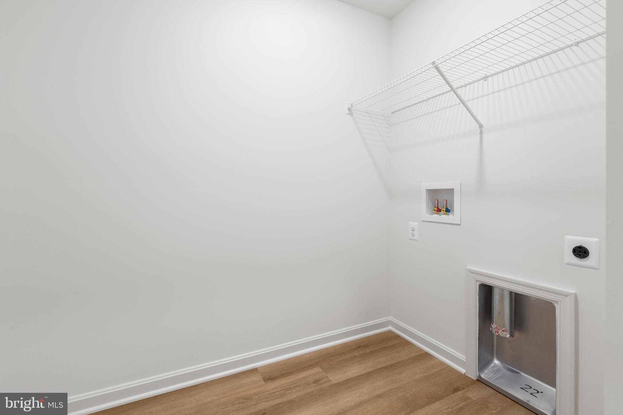 34198 Enchanted Way Locust Grove, VA 22508 - Photo 41 of 62 a view of a room with closet and wooden floor