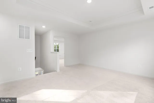 a view of a house with a yard and garage