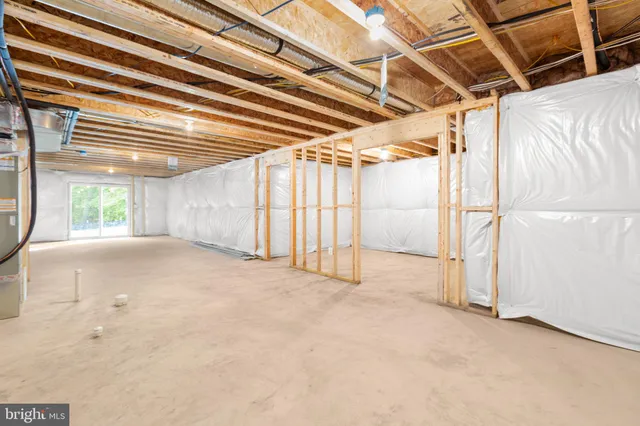 a view of a house with a yard and garage