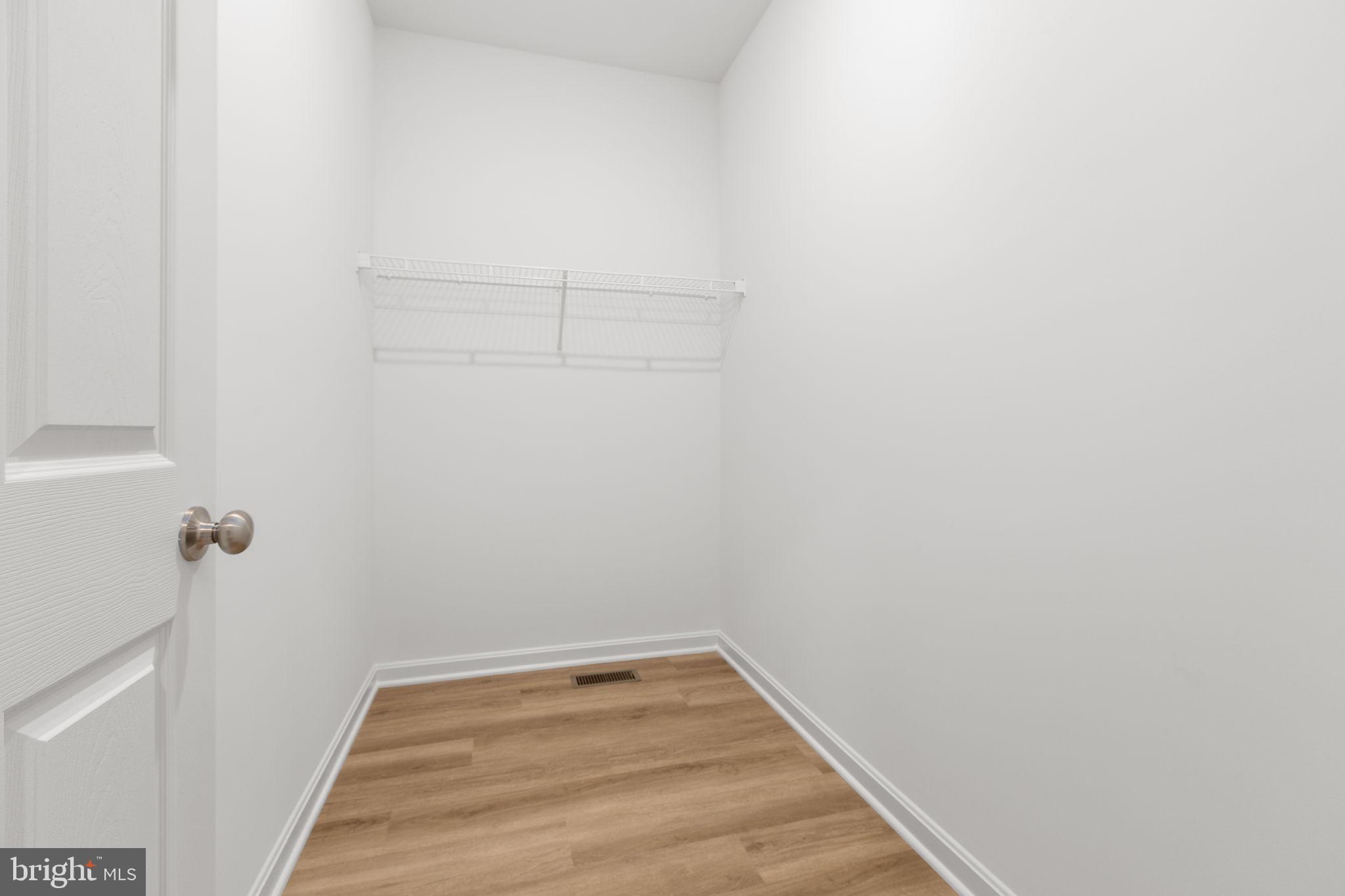 34198 Enchanted Way Locust Grove, VA 22508 - Photo 49 of 62 a view of a room with racks on the wall