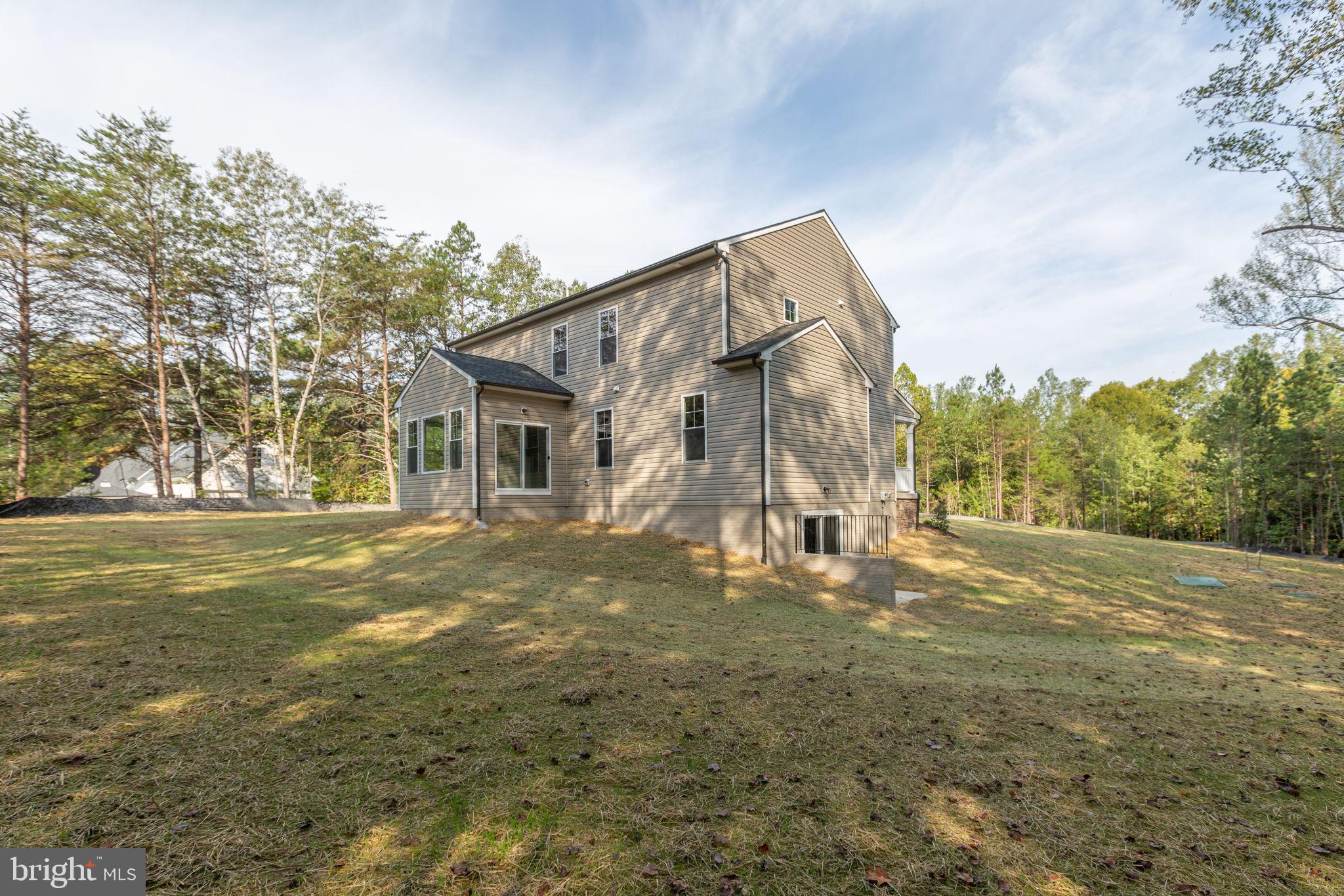 34198 Enchanted Way Locust Grove, VA 22508 - Photo 50 of 62 a view of a house with a yard