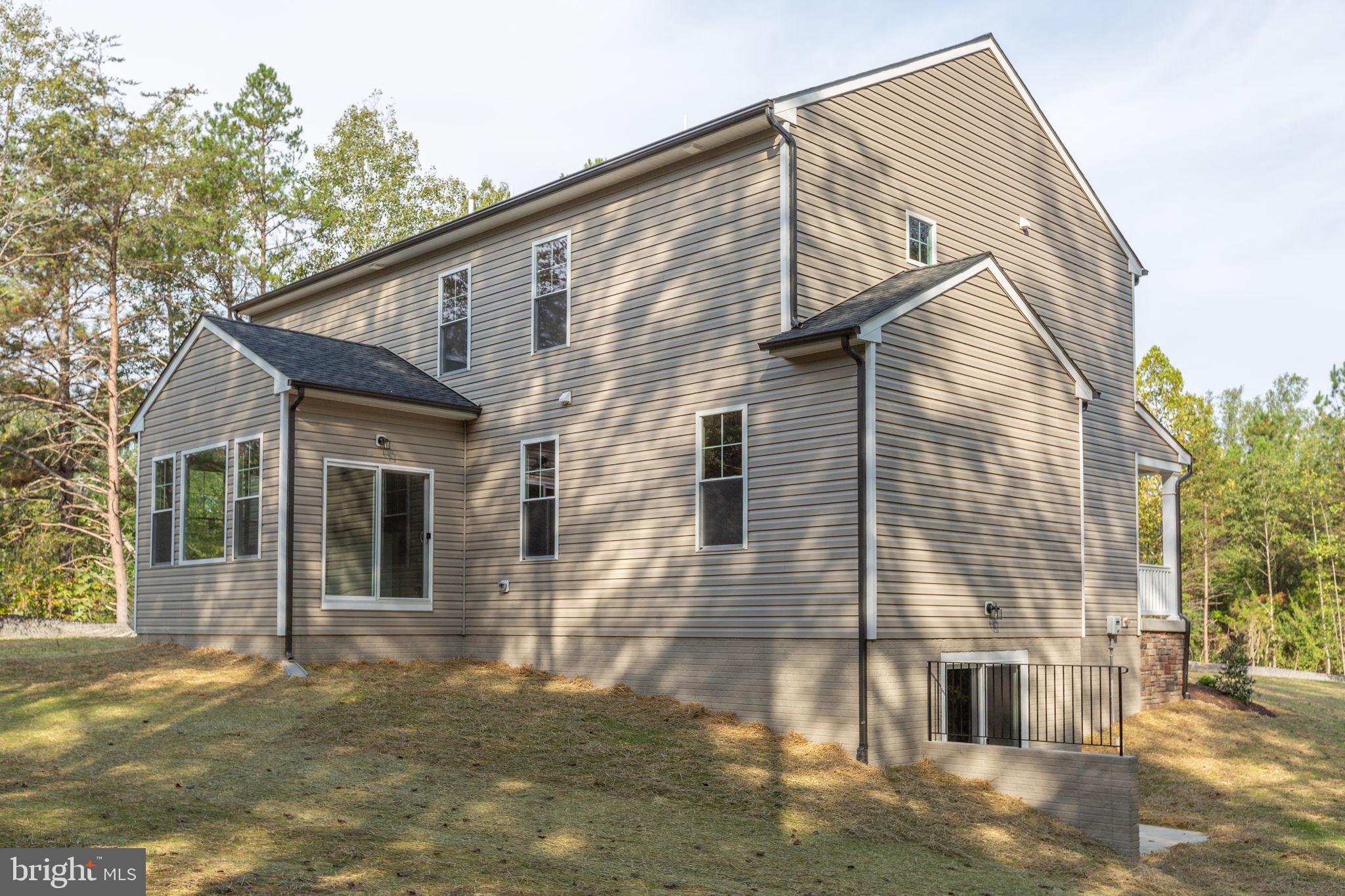 34198 Enchanted Way Locust Grove, VA 22508 - Photo 51 of 62 a view of a house with a yard