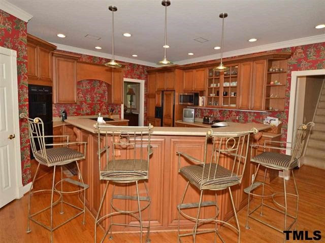 1701 Liatris Lane Raleigh, NC 27613 - Photo 13 of 25 BIG CENTER ISLAND, CUSTOM MAPLE DRAWER SYSTEM. OPEN AND BRIGHT KITCHEN! Kitchen