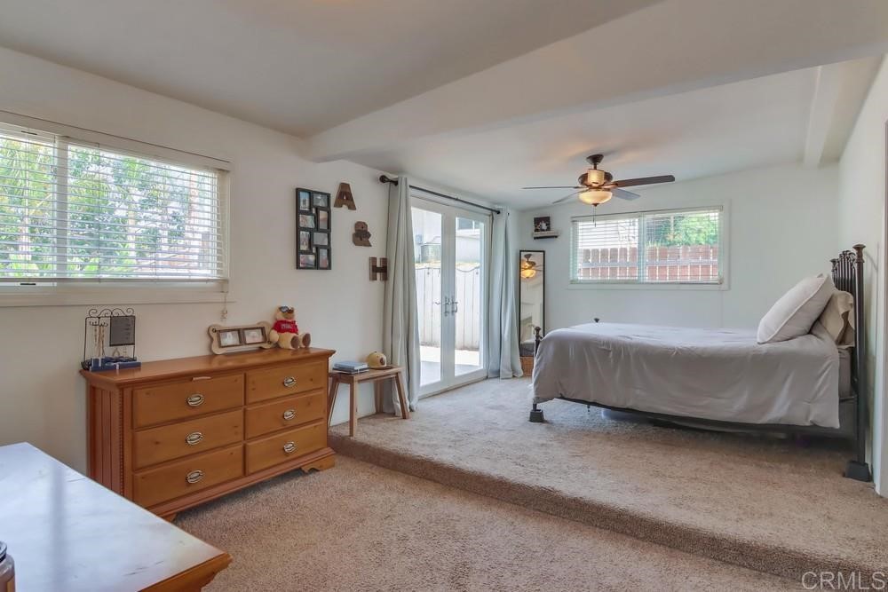 9201 Shadow Hill Road Santee, CA 92071 - Photo 11 of 30 a bedroom with a bed and windows