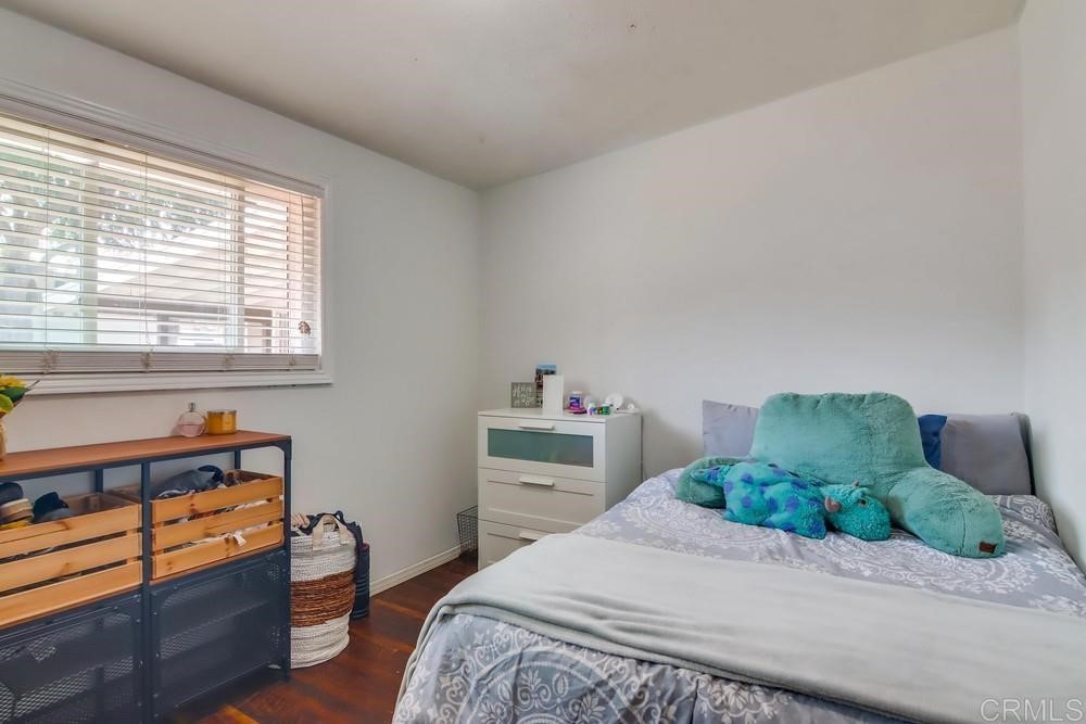 9201 Shadow Hill Road Santee, CA 92071 - Photo 15 of 30 a bedroom with a bed and a window