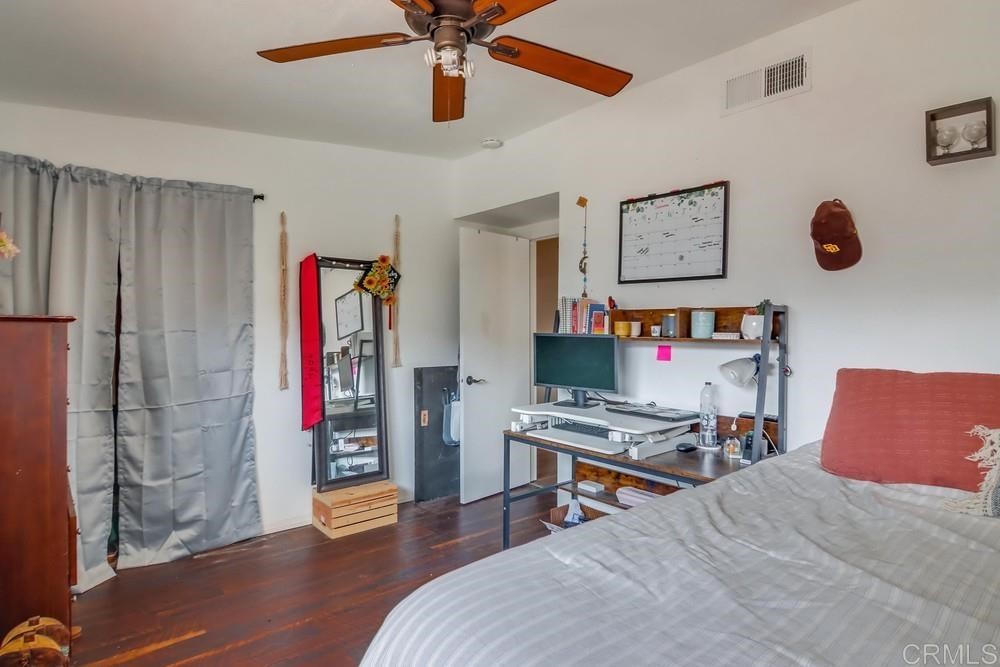 9201 Shadow Hill Road Santee, CA 92071 - Photo 19 of 30 a bedroom with a bed and a desk