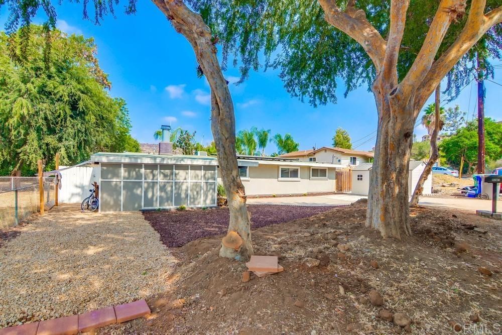 9201 Shadow Hill Road Santee, CA 92071 - Photo 30 of 30 a view of a house with backyard and trees