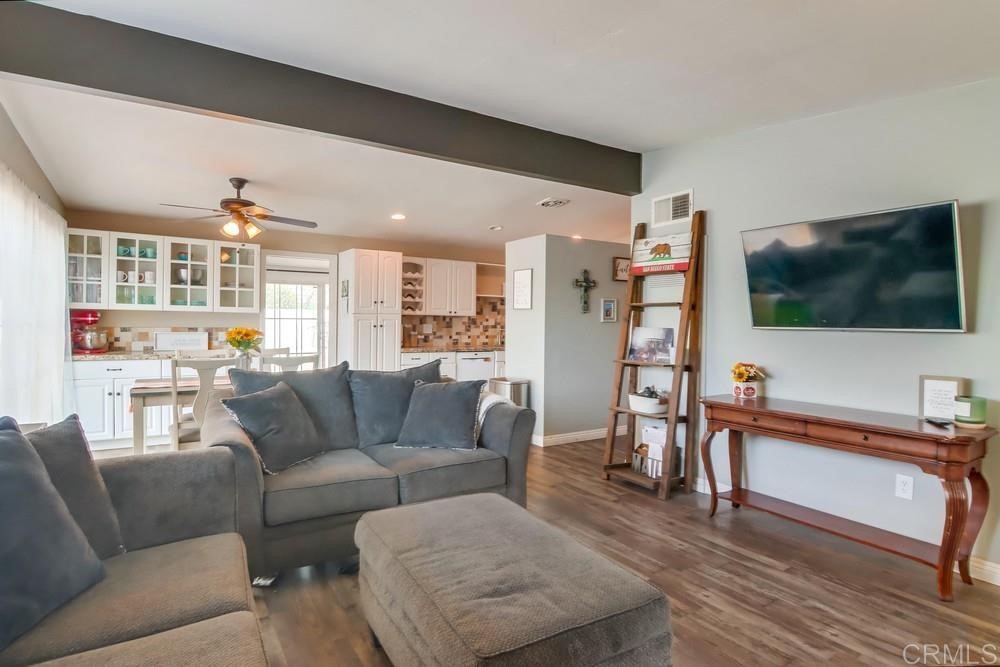 9201 Shadow Hill Road Santee, CA 92071 - Photo 4 of 30 a living room with furniture and a flat screen tv