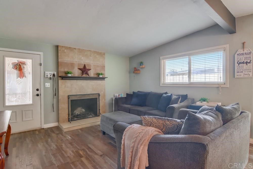 9201 Shadow Hill Road Santee, CA 92071 - Photo 5 of 30 a living room with furniture and a fireplace