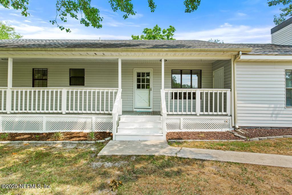 54308 Hurst Road Callahan, FL 32011 - Photo 2 of 49 a view of a house with a yard