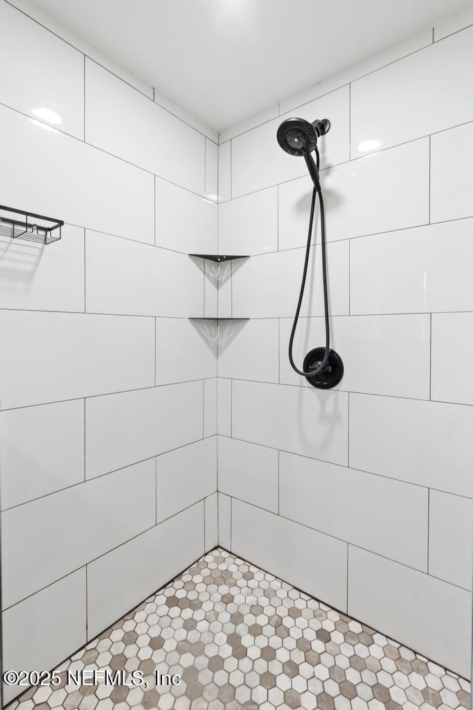 54308 Hurst Road Callahan, FL 32011 - Photo 34 of 49 a bathroom with a shower