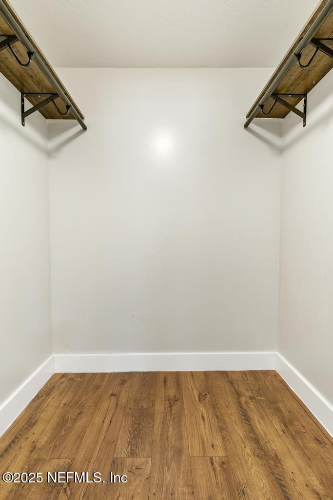 54308 Hurst Road Callahan, FL 32011 - Photo 42 of 49 a view of a room with wooden floor