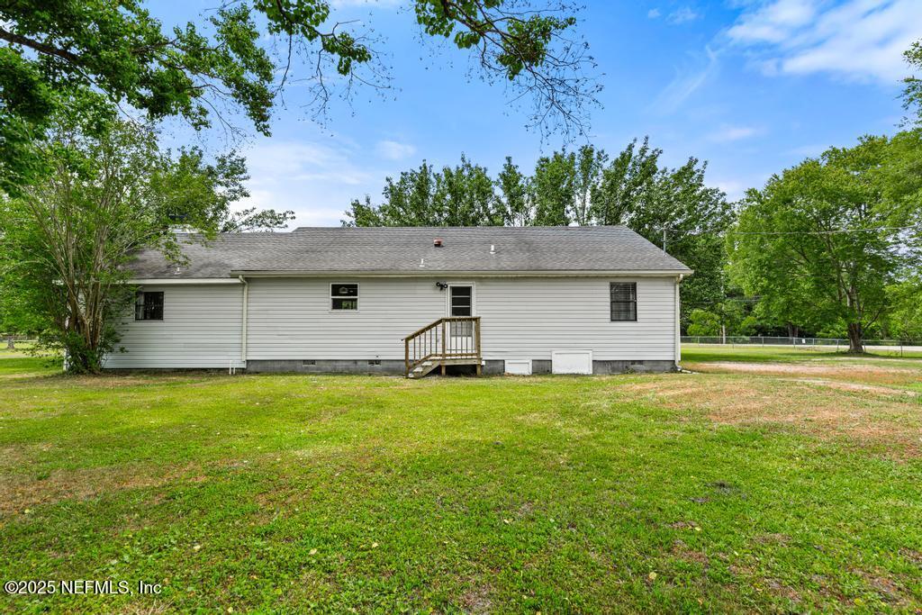 54308 Hurst Road Callahan, FL 32011 - Photo 44 of 49 a house view with a garden space