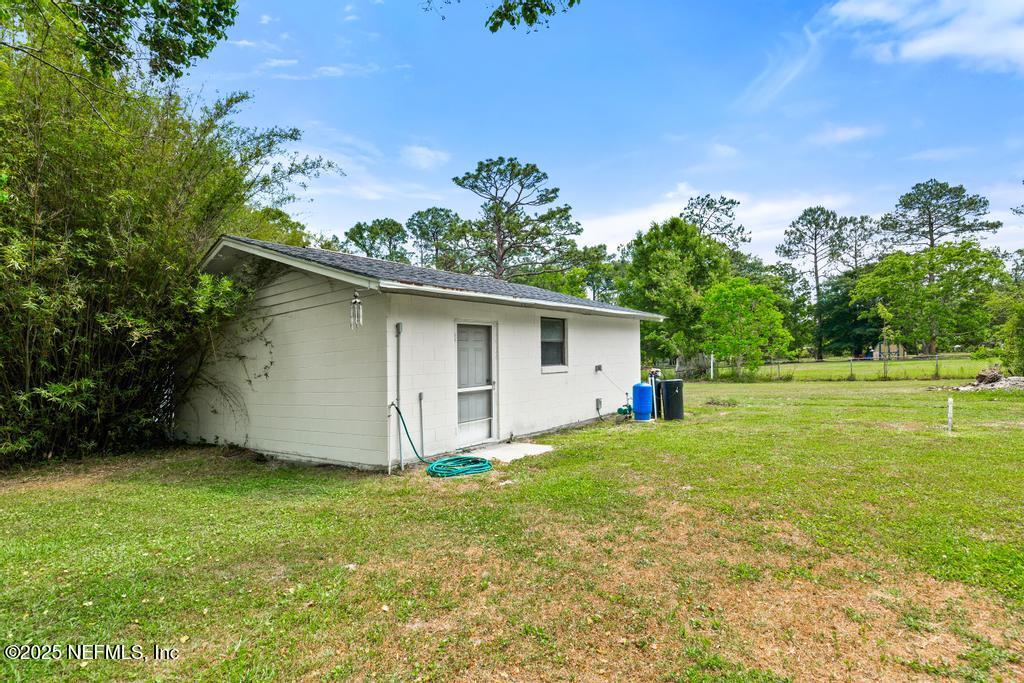 54308 Hurst Road Callahan, FL 32011 - Photo 45 of 49 a view of a house with a yard