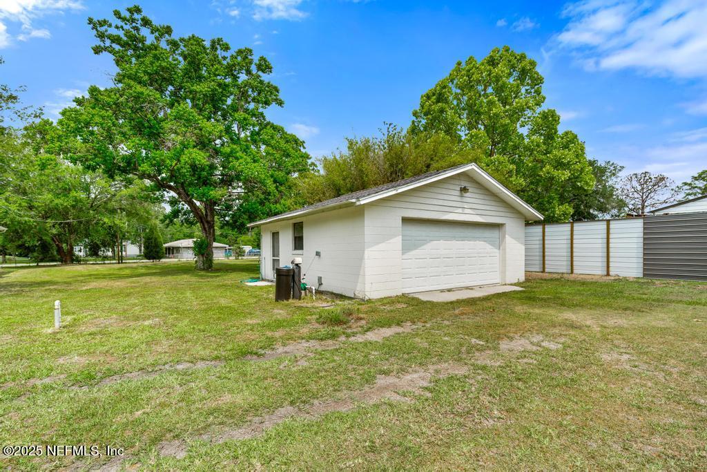 54308 Hurst Road Callahan, FL 32011 - Photo 47 of 49 a view of a house with a yard